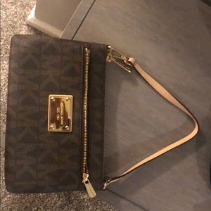 MK wristlet or small bag (pic shown both ways)